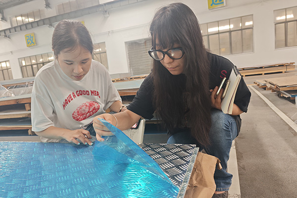 New employees go deep into the warehouse for field study